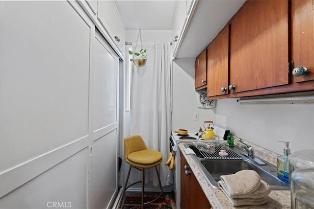 kitchen with sink and range