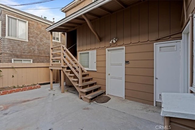 doorway to property featuring a patio area