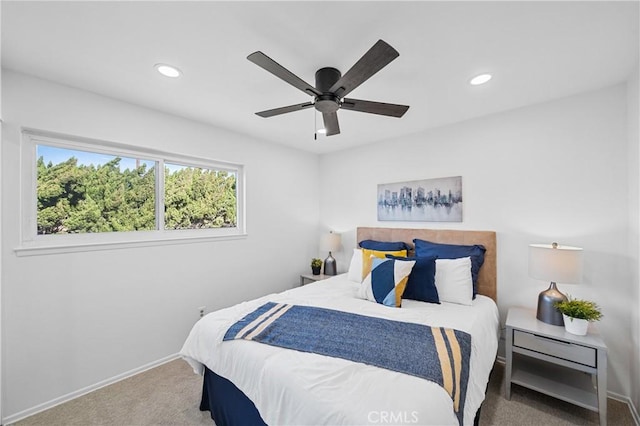 bedroom featuring ceiling fan and carpet flooring