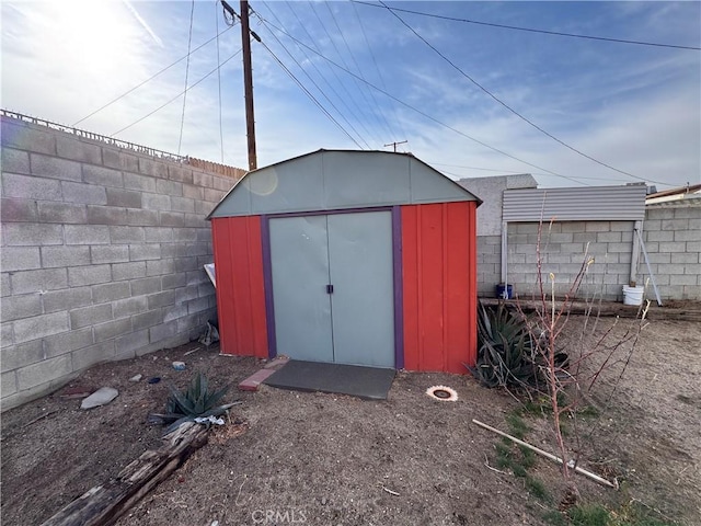1704 Sunrise Rd, Barstow, CA 92311 - view of shed with a fenced backyard