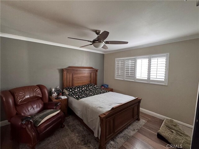 1704 Sunrise Rd, Barstow, CA 92311 - bedroom featuring ornamental molding, wood finished floors, baseboards, and a ceiling fan