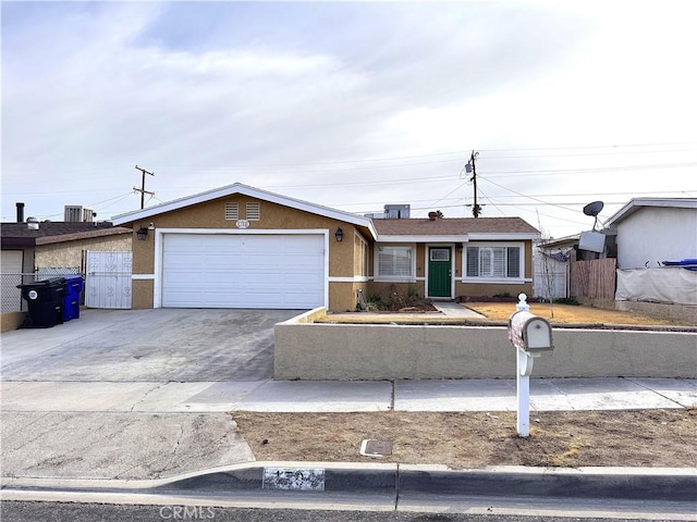 ranch-style house with a garage and cooling unit