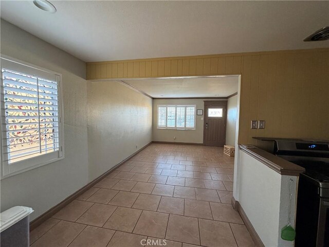 1704 Sunrise Rd, Barstow, CA 92311 - interior space with baseboards and light tile patterned floors