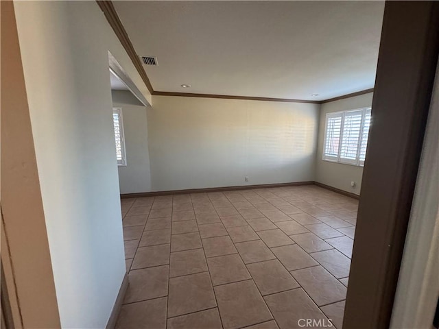 1704 Sunrise Rd, Barstow, CA 92311 - tiled spare room featuring ornamental molding and baseboards