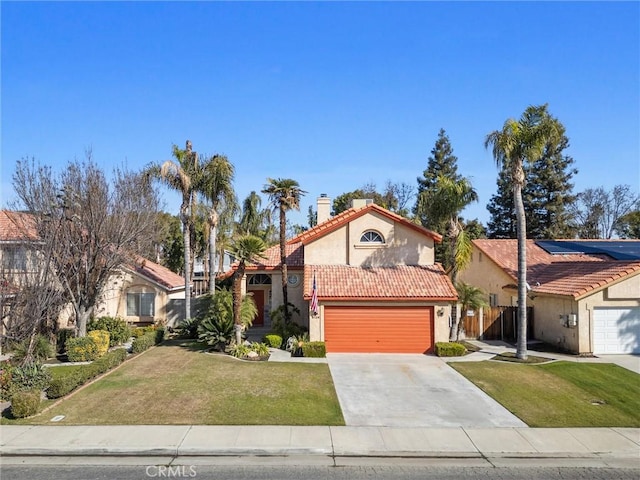 mediterranean / spanish home featuring a front yard