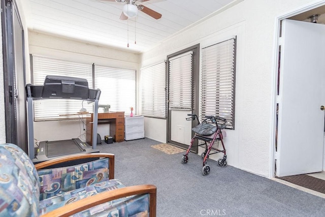 interior space featuring ceiling fan