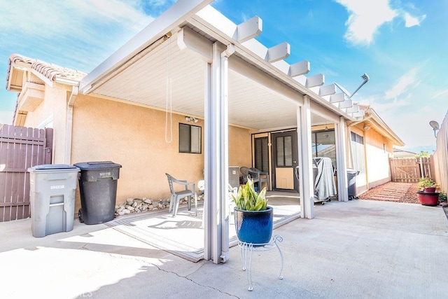 rear view of property with a patio area