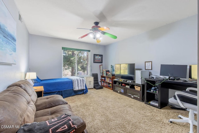 carpeted bedroom with ceiling fan