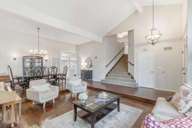 living room with an inviting chandelier, beam ceiling, high vaulted ceiling, and dark hardwood / wood-style floors