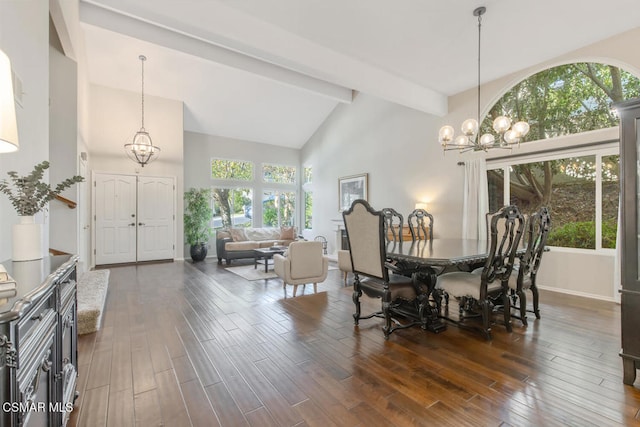 dining space featuring an inviting chandelier, beam ceiling, and high vaulted ceiling