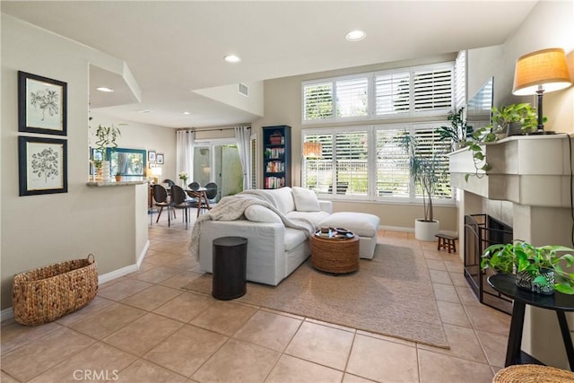 living room with light tile patterned floors