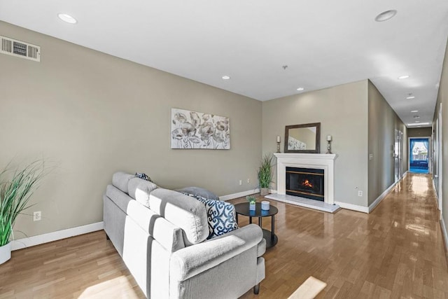 living room with hardwood / wood-style flooring