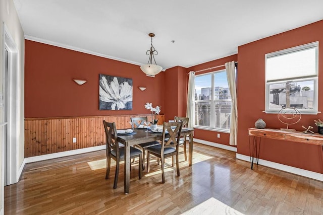 dining space featuring hardwood / wood-style flooring