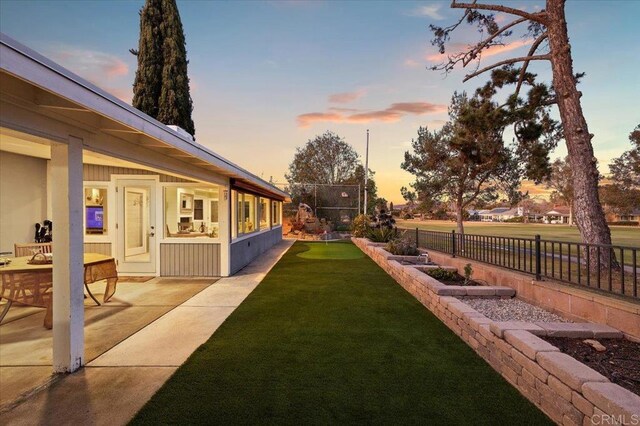 view of yard featuring a patio area and fence