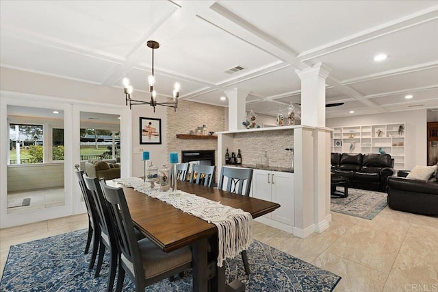 dining area with visible vents, built in shelves, a chandelier, recessed lighting, and coffered ceiling