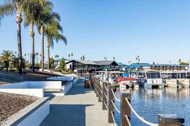 dock area with a water view