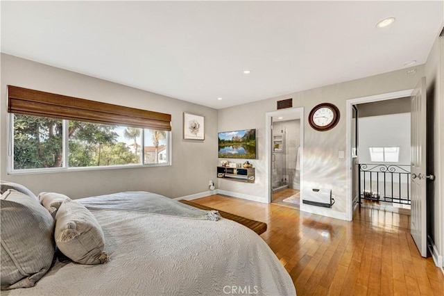 bedroom featuring hardwood / wood-style floors