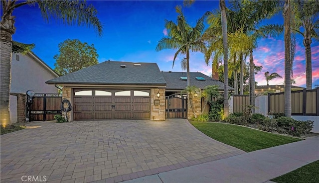 view of front of home with a garage