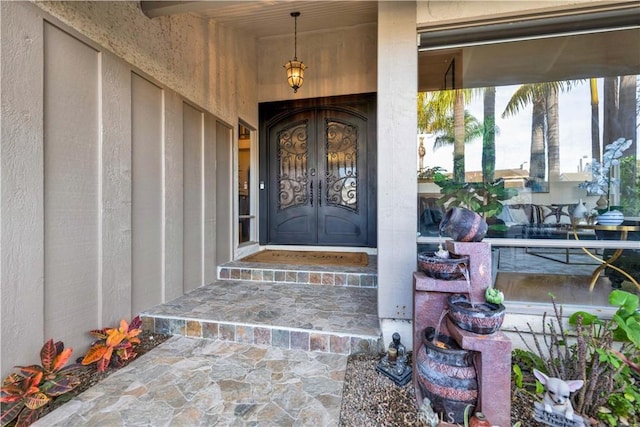 view of exterior entry with french doors