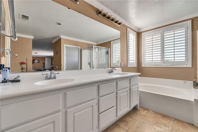 bathroom featuring vanity, tile patterned floors, ornamental molding, and separate shower and tub