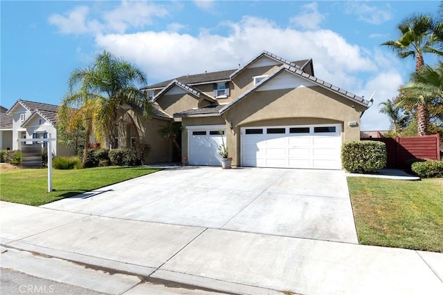 view of front of house featuring a garage and a front yard