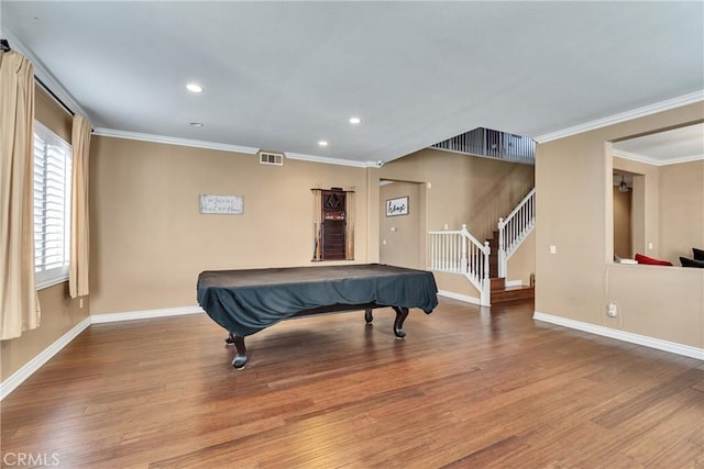 rec room with crown molding, hardwood / wood-style floors, and pool table