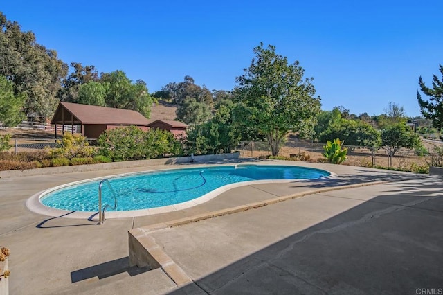 view of pool with a patio area