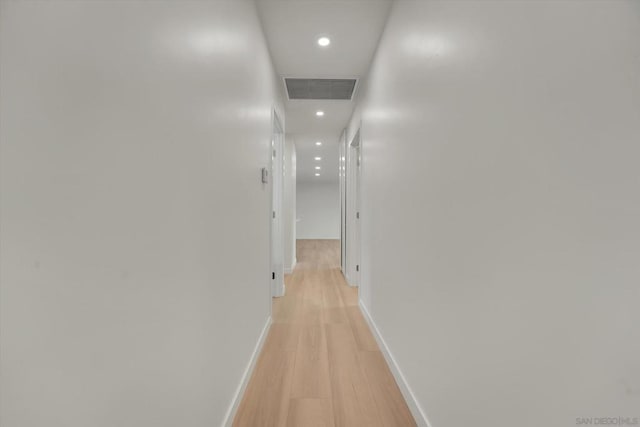 corridor featuring light wood-type flooring