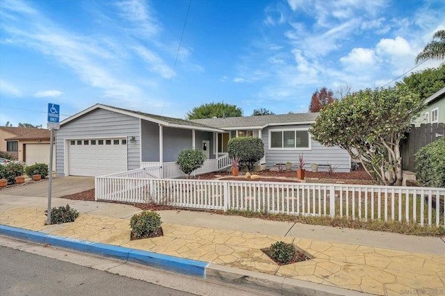 ranch-style home featuring a garage