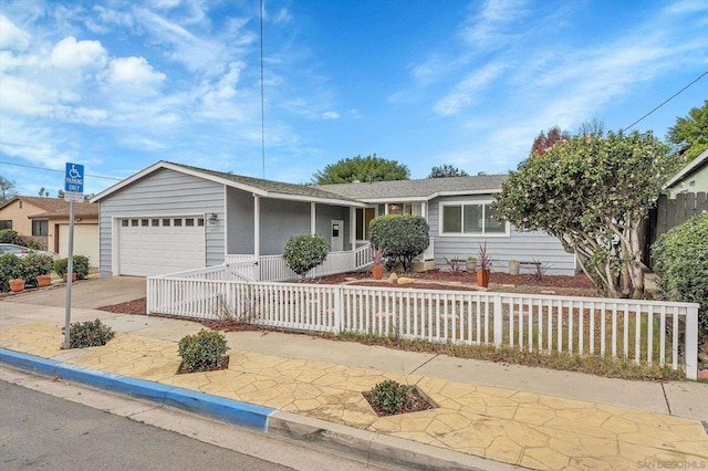 ranch-style house featuring a garage