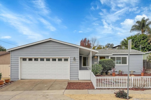 single story home featuring a garage