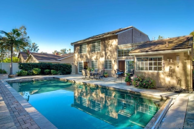 view of pool featuring a patio area