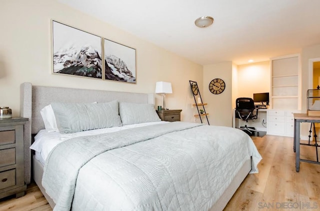 bedroom with light wood-type flooring