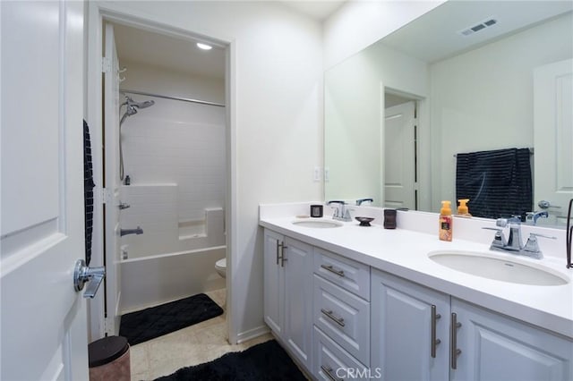 full bathroom with vanity, tile patterned flooring, bathing tub / shower combination, and toilet