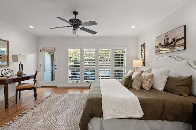 bedroom featuring crown molding, ceiling fan, access to exterior, and light wood-type flooring