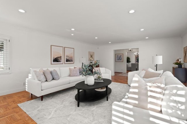 living room featuring light parquet flooring and ornamental molding