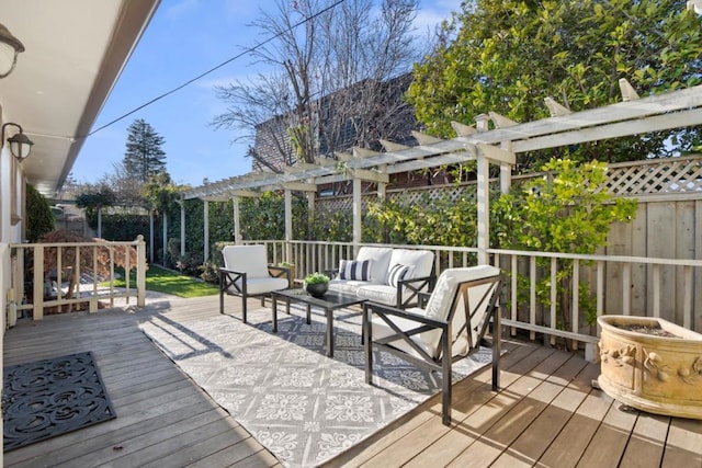 deck featuring an outdoor hangout area and a pergola