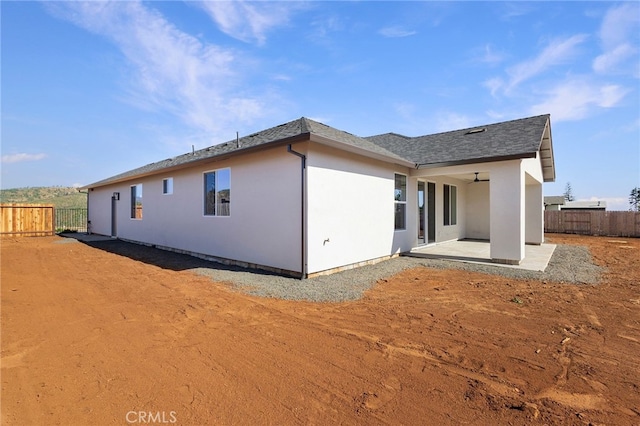 back of property featuring a patio area