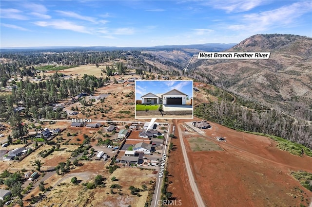 aerial view featuring a mountain view