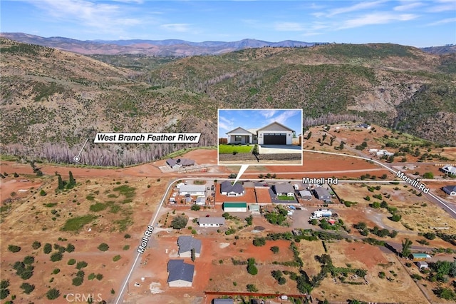 bird's eye view featuring a mountain view