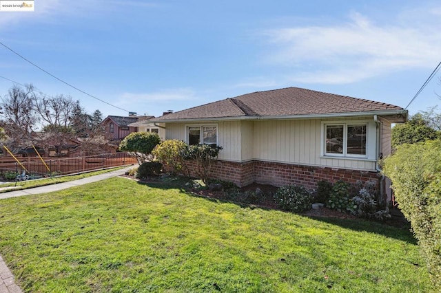 view of property exterior with a lawn