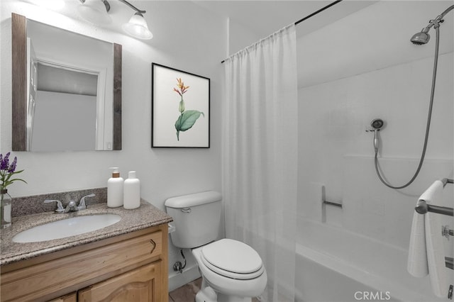 full bathroom featuring shower / tub combo, toilet, and vanity