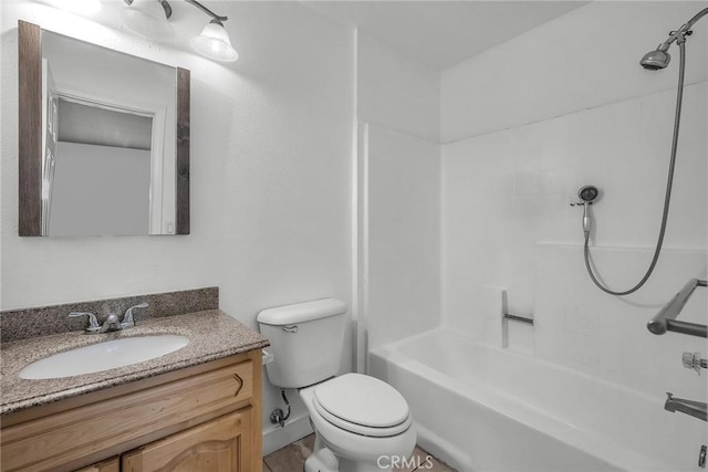 full bathroom with toilet,  shower combination, and vanity