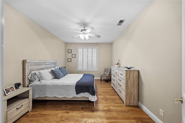 bedroom featuring ceiling fan and light hardwood / wood-style flooring