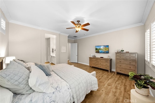 bedroom with crown molding, ceiling fan, light hardwood / wood-style floors, and ensuite bath