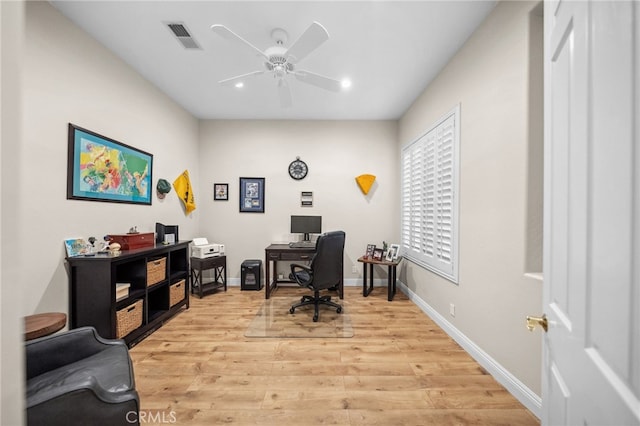 office featuring ceiling fan and light wood-type flooring