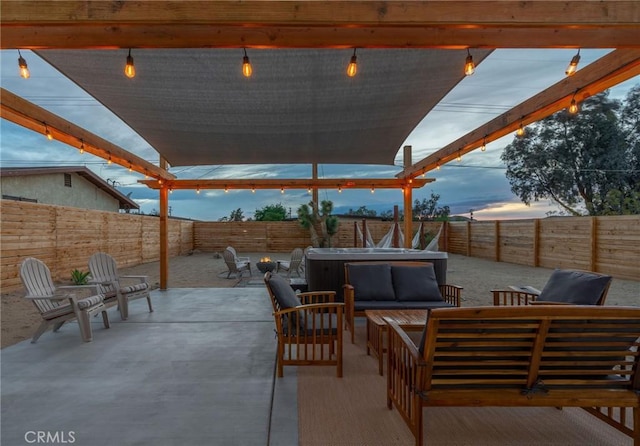 patio terrace at dusk with an outdoor hangout area