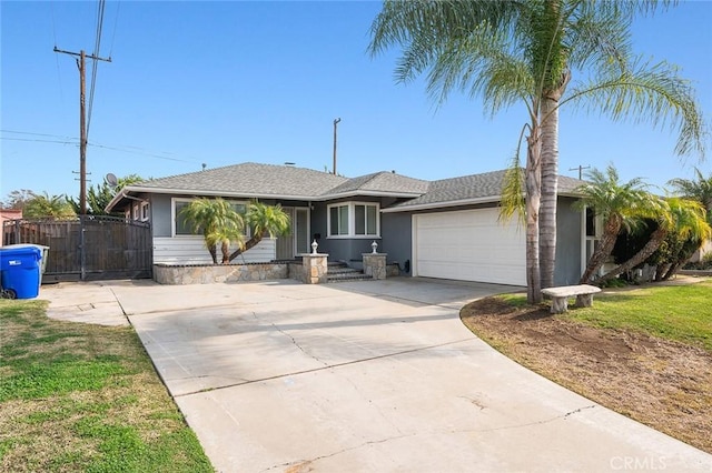 ranch-style home with a garage and a front yard