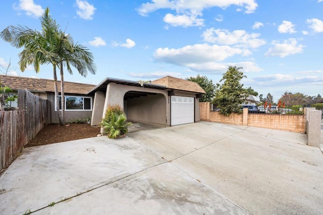 exterior space with a garage