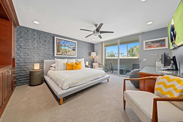 bedroom with ceiling fan, brick wall, access to exterior, and light colored carpet